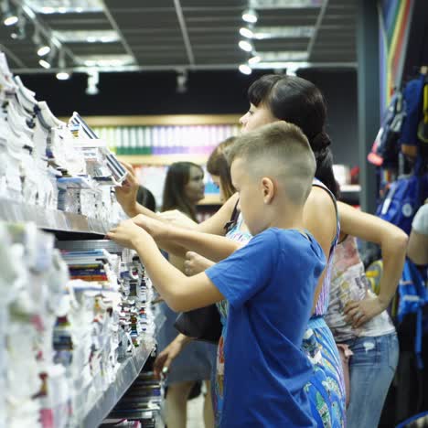 vinnitsa, ukraine - august, 2018: back to school concept. purchase of stationery in the store