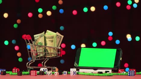 un video de navidad con un salvador de pantalla, un carrito con dólares, un teléfono inteligente con una llave de croma.