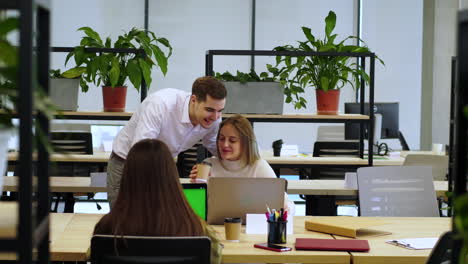 coworkers talking in the office