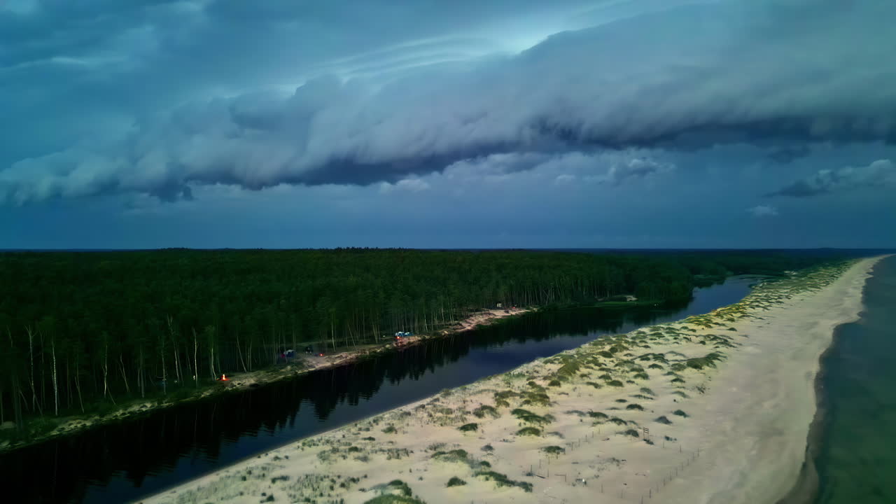 Aerial View of a Coastal Landscape Under Dramatic Storm Clouds