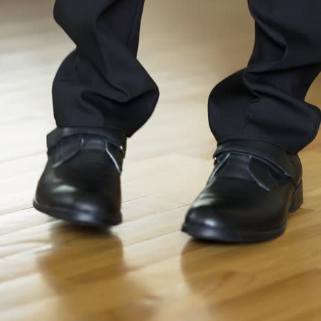 barefoot guy put on ones shoes