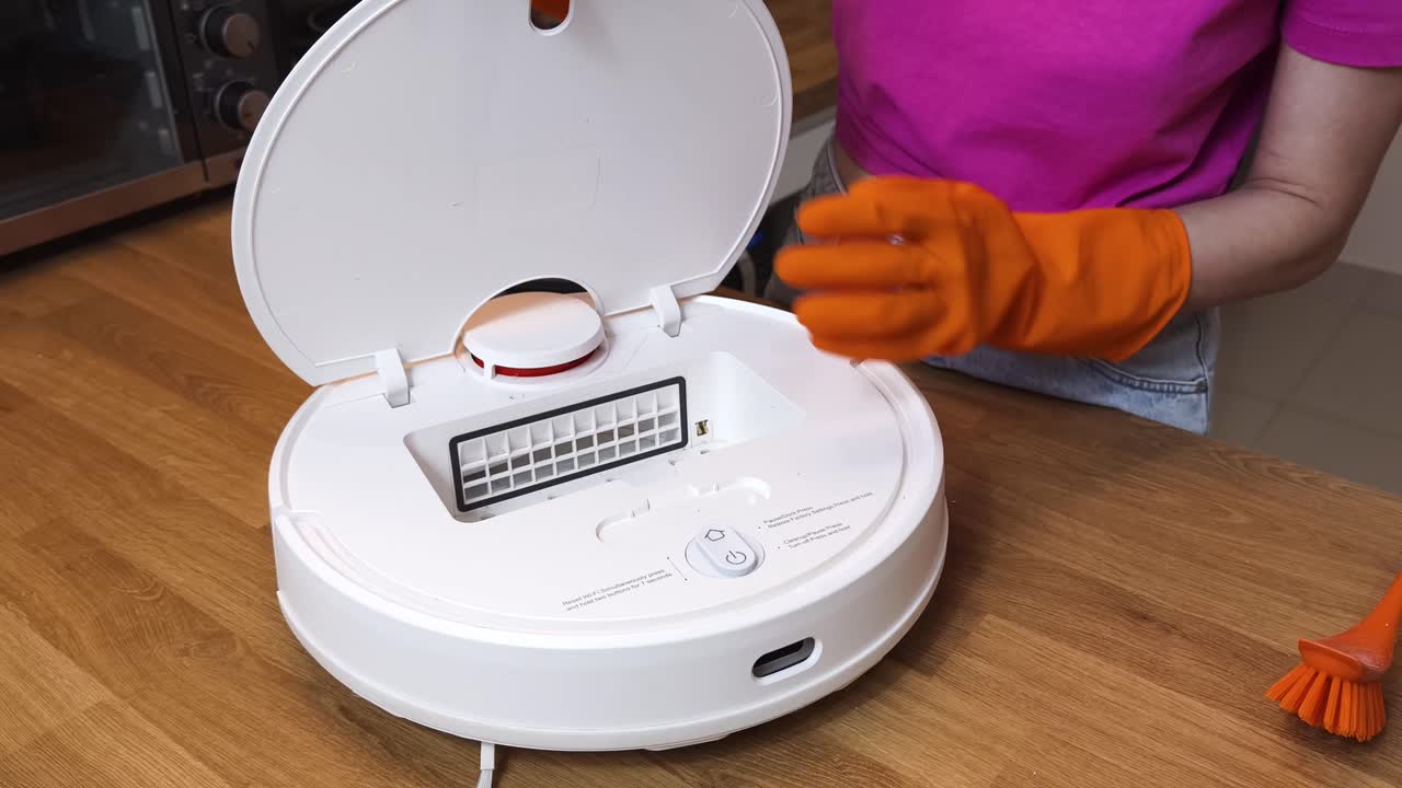 Cleaning a robot vacuum