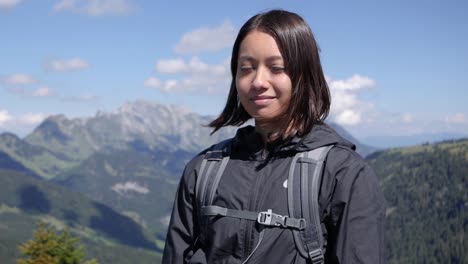 portrait of a hiker girl posing in slow motion at amden swiss