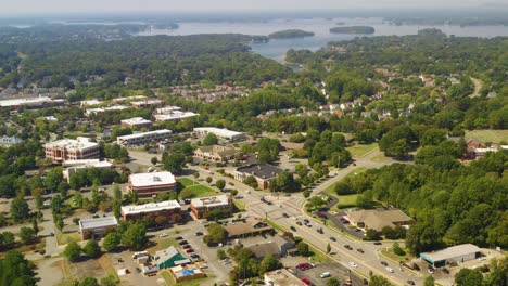 Drone-Dolly-Left-showing-Roads-and-Businesses-in-Cornelius,-North-Carolina