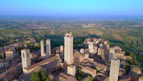 nice aerial top view flight walled medieval hill tower town tuscany italy san gimignano