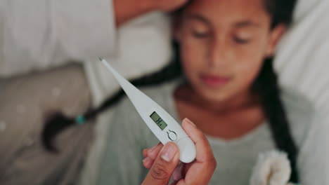 Thermometer,-fever-and-parent-with-child-in-bed