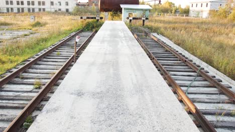 railroad platform in an industrial area