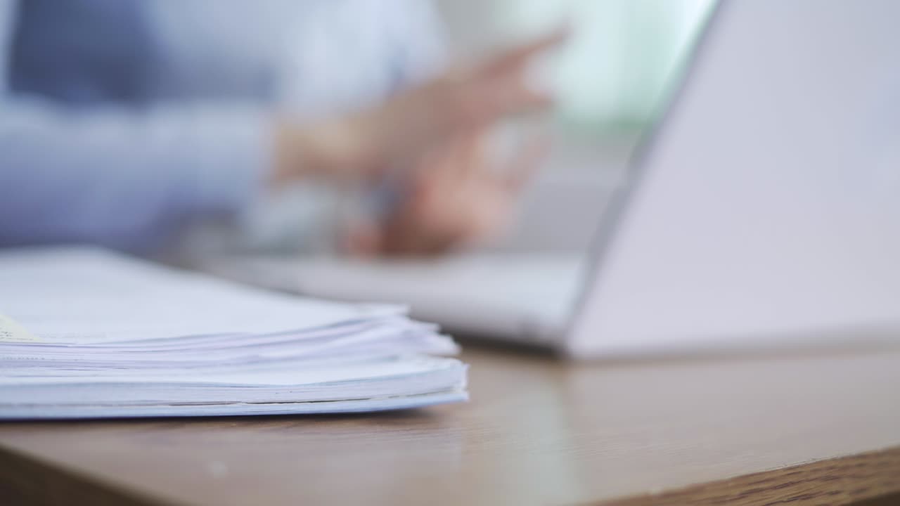 Close up image female hands typing on laptop keyboard