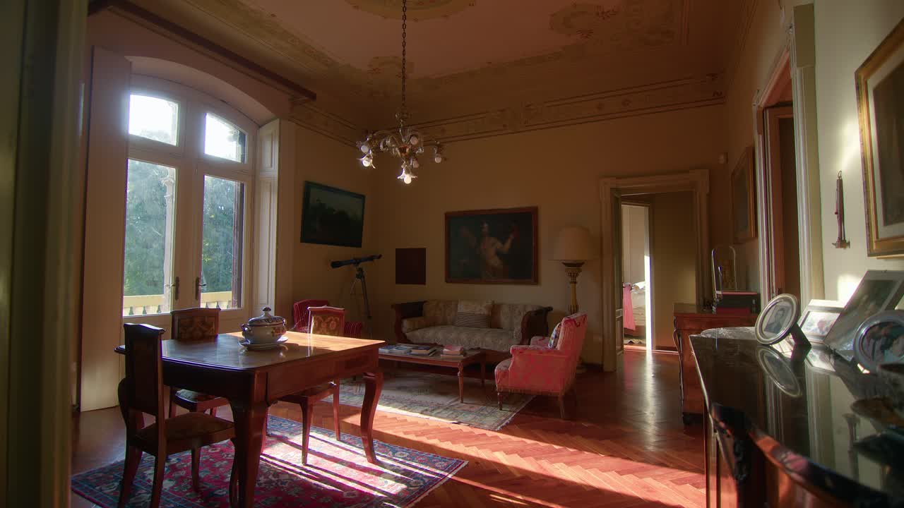 Static shot of villa living room, vintage decor, Italian countryside in fall