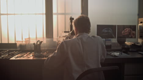 scientists working in a paleontology lab