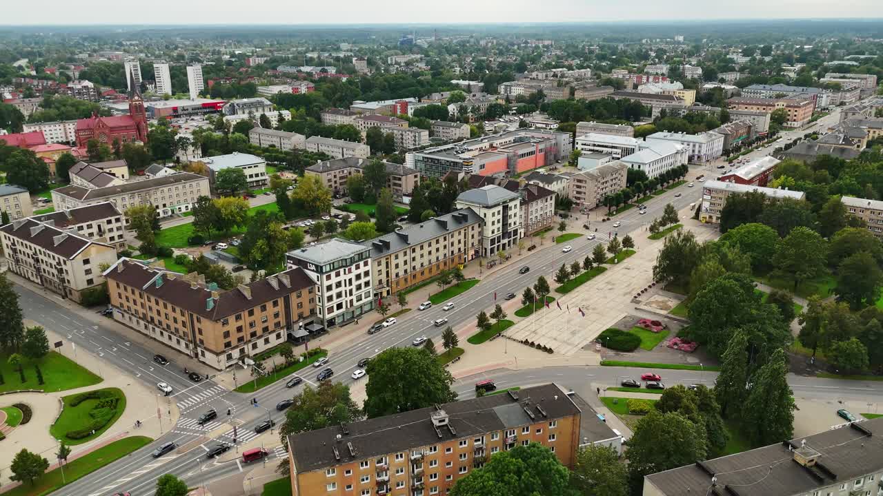 Aerial view of Jelgava cityscape showcasing buildings and greenery
