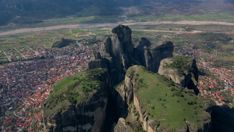 wide drone angle of meteora rock formations and isolated monastery near kalambaka, greece