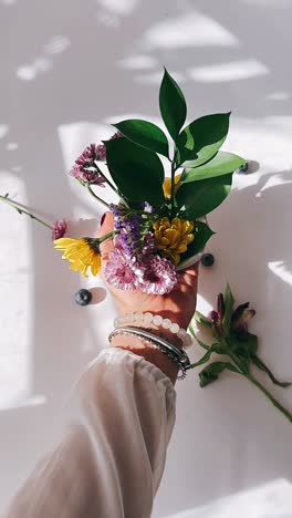 woman holding a beautiful flower bouquet