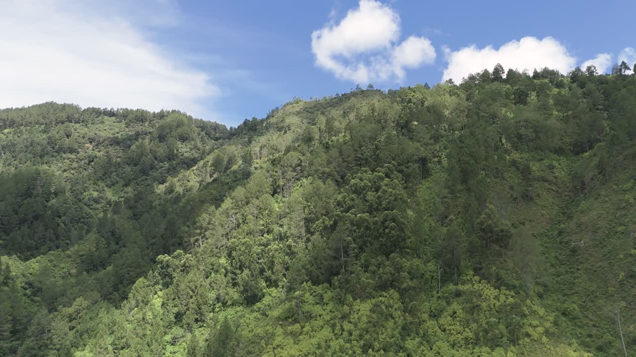 Flying a drone over the mountains around Lake Toba