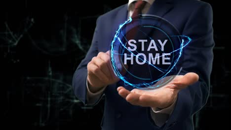 businessman shows concept hologram stay home
