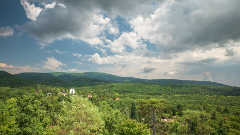 Mountain-view-with-low-clouds-and-blue-sky-a-sunny-day