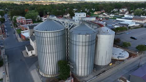 Brock-grain-bins-in-downtown-in-USA-town