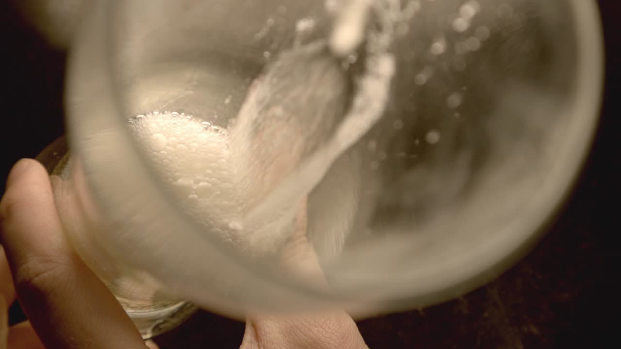 Pouring Beer Into A Glass - close up