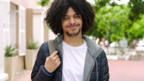 Portrait-of-an-Afro-man-smiling-outside