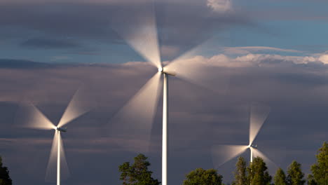 time lapse of wind turbines in cloudy weather