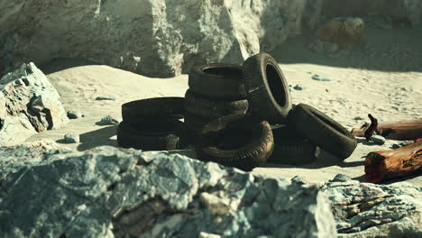 old abandoned tyres on sea shore