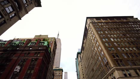 moving shot of nyc new york city manhattan iconic skyscrapers with empire state building