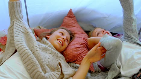 siblings having fun inside the tent 4k