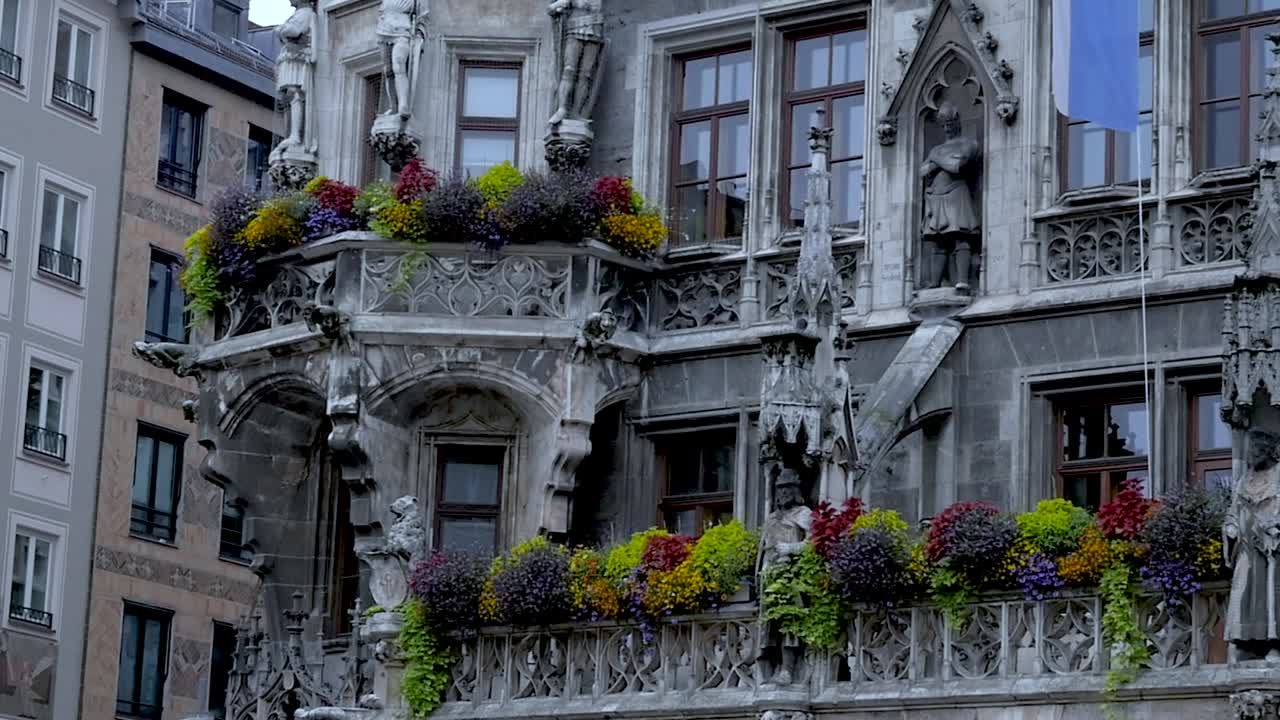 Slow motion still shot of Rathaus-Glockenspiel Architecture building in Marienplatz town square Munich Germany 1920x1080 HD