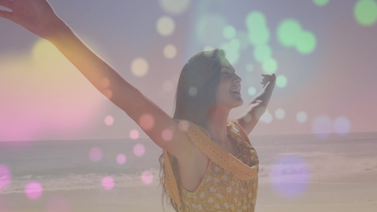 Joyfully embracing beach, woman in yellow dress with colorful animation overlay