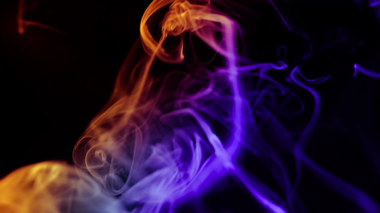 Abstract color mixed smoke on black background,