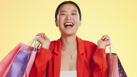 happy, face and woman in studio with shopping