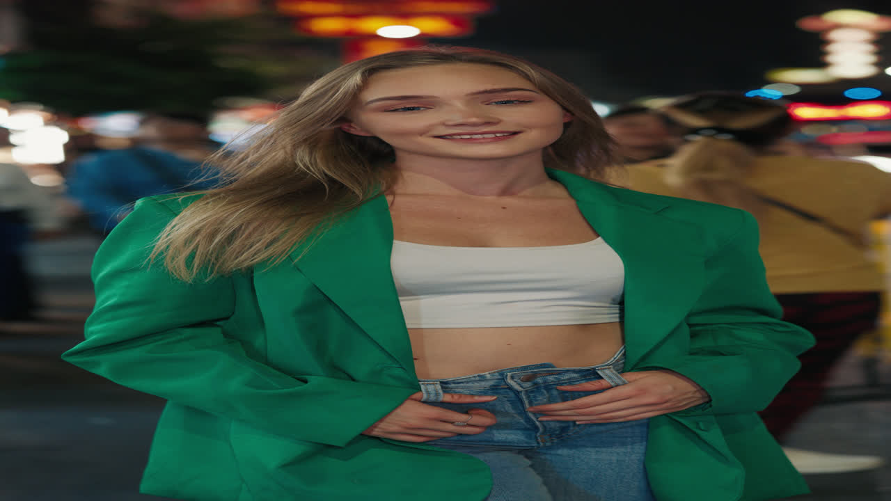 Young Woman in Green Blazer at Night