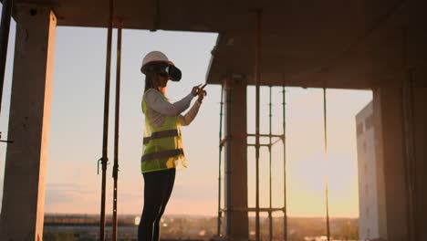 female engineer wearing vr headset managing construction project.