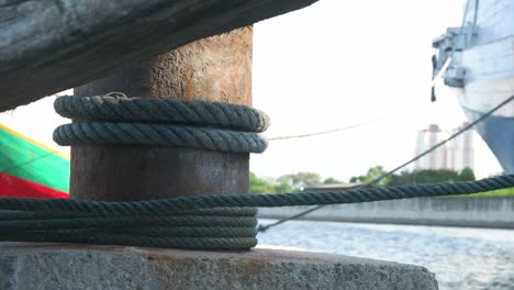 close up of the mast for tying the ship's rope