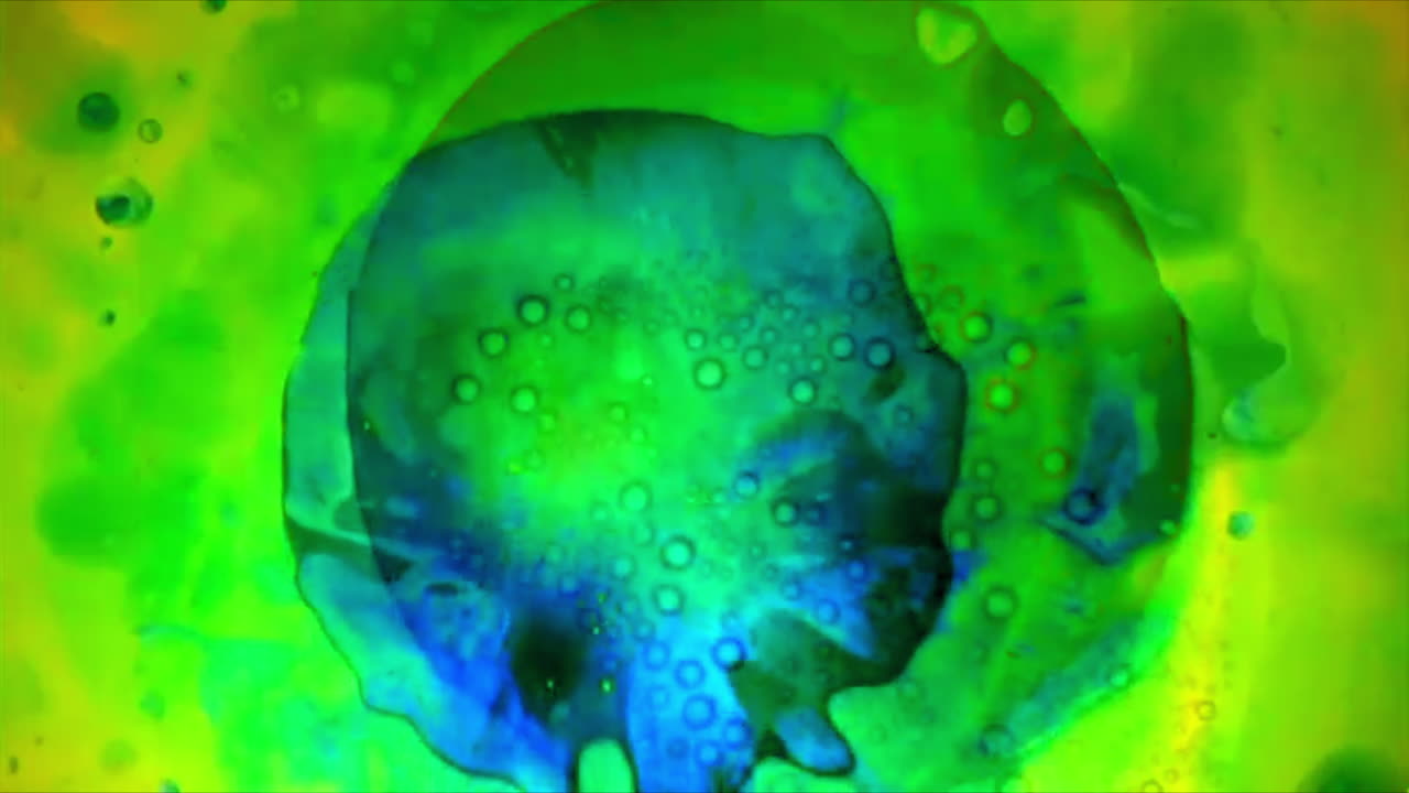Psychedelic liquid light effect in green and blue
