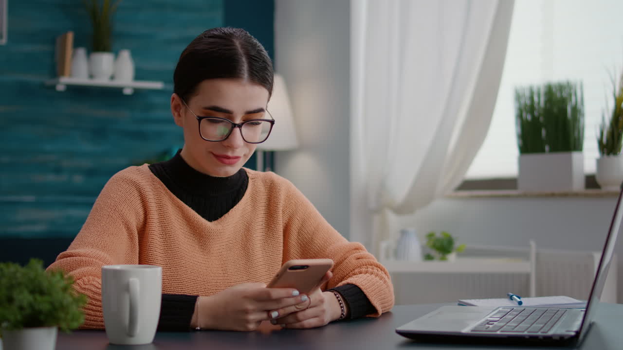 College student browsing internet on smartphone