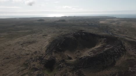 aerial flying above mystical crater raudhóll in national park snaefellsnes