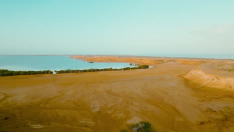 aerial level shot of the desert going to the desert, colombia, la guajira