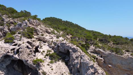 Two-climbers-have-reached-the-finish,-standing-on-the-precipice