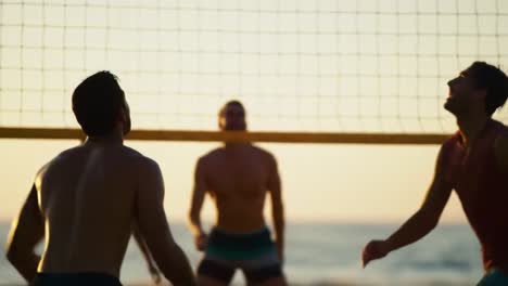 exciting beach volleyball match at sunset: thrilling moments captured in a competitive game with friends on a beautiful shoreline