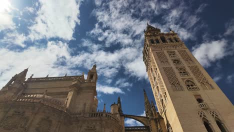 timelapse of clouds over seville cathedral in spain