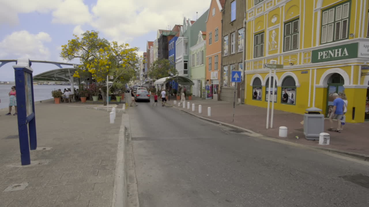 Willemstad, Curaçao main street waterfront. Sint Anna Bay main street. Dutch architecture tilt down