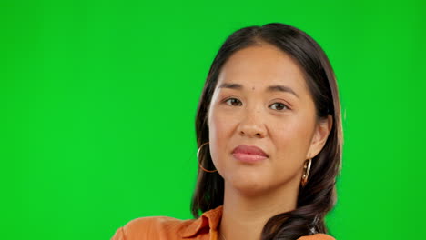 Face,-serious-and-woman-on-green-screen-in-studio