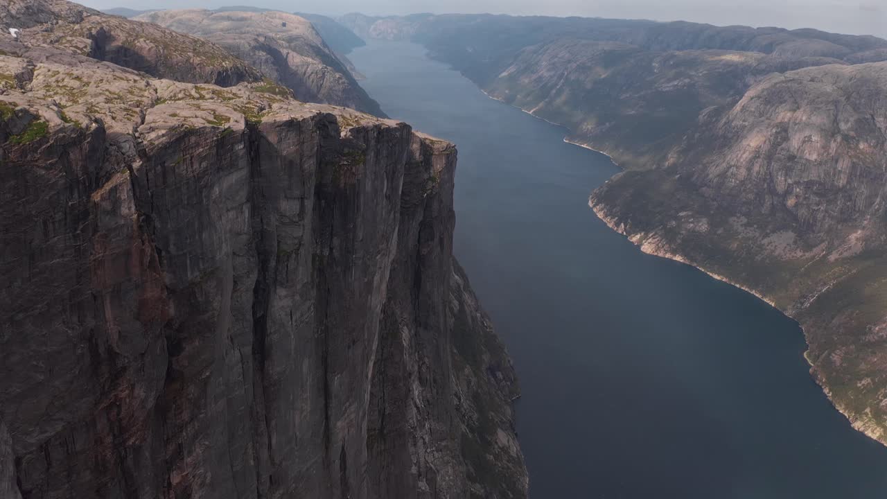 Majestic aerial view of a fjord in Kjeragbolten Norway, showcasing rugged cliffs and calm waters