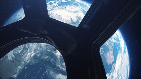 la tierra vista desde una ventana de la estación espacial