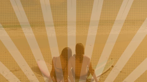 male surfer and female surfer sitting on beach, overlaying marketing data graphs above surfboards