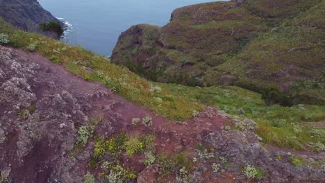 Epic-mountain-and-coastline-reveal-of-Roque-de-Taborno-hike-in-Tenerife,-Canary-Islands,-Spain---aerial-view