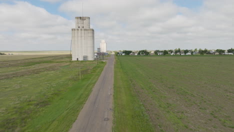 aerial view of rural town with grain silos