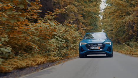 new modern city car driving on the road. stylish auto speed driving and traveling.