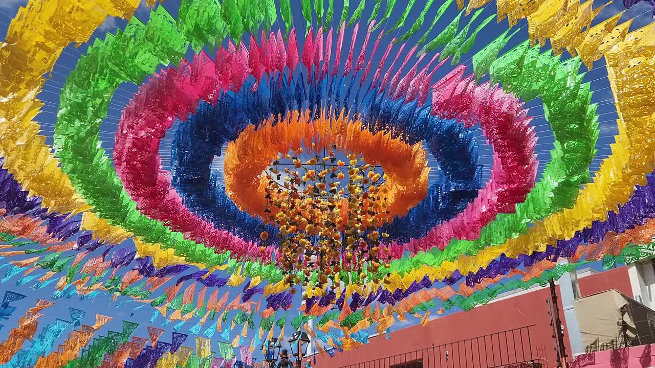 papel picado flapping in the wind in Oaxaca Mexico